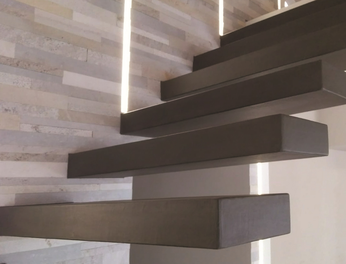 Concrete cantilevered stair coating